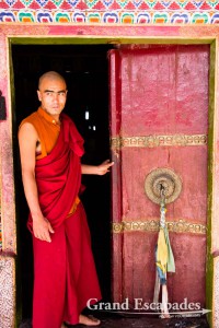 Monk at the door of the Summur Monastery, in the Nubra Valley, Ladakh, Jammu & Kashmnir, India