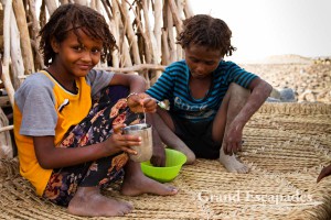 Young Afar girl playing, Afar village of Hamed Ale, Danakil Depression, Ethiopia