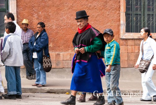 Blue skirts, thin hand-woven ponchos and a bowler hat, Guambiano Indigenous Market, Silvia, near Popayan, Cauca, Colombia, South America