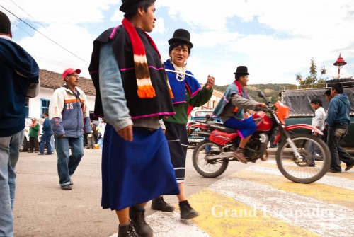 Blue skirts, thin hand-woven ponchos and a bowler hat, Guambiano Indigenous Market, Silvia, near Popayan, Cauca, Colombia, South America