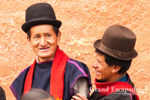 Blue skirts, thin hand-woven ponchos and a bowler hat, Guambiano Indigenous Market, Silvia, near Popayan, Cauca, Colombia, South America