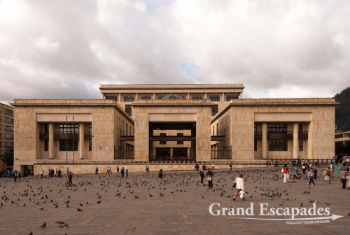 On our last day in town, sunshine touched Plaza de Bolivar and the thousands of pigeons that ascend on Bogota?s most famous square to feed on the maize that children throw at them. The very same children then take great pleasure in running into the throve of pigeons making them to fly off in panic. The plaza is surrounded by churches and official buildings underlying its importance