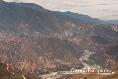 For those wondering if it is worth dishing out the 30.000 COP or 15 USD for the 6 kilometer ride down and up to the other rim, La Mesa de Los Santos, well, the best view of the canyon is actually from the ?Mirador? high above on the side of the entrance gate, because you have a 360 degree view and can see the river?s meandering around a mountain