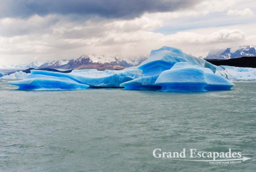 During the boat trip, we passed large icebergs floating in the milky, green water heralding the nearby glaciers - Lago Argentina, Parque Nacional de los Glaciares, El Calafate, South Patagonia, South America