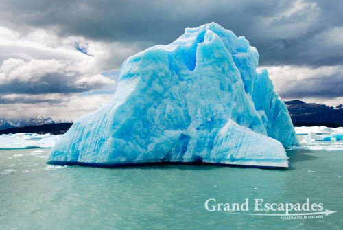 During the boat trip, we passed large icebergs floating in the milky, green water heralding the nearby glaciers - Lago Argentina, Parque Nacional de los Glaciares, El Calafate, South Patagonia, South America