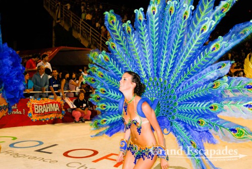 The dancers were a swaying sea of colours of elaborately designed costumes, headdresses made of feathers and beads, more beadwork for ankles, necks, belly and wrists. The costumes can be made of lots of material or of very, very little, Carneval of Gualeyguachu, Argentina