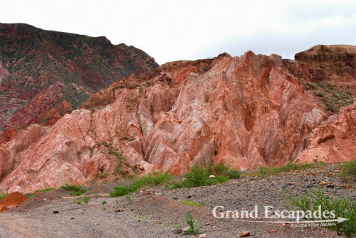 La Quebrada de Cafayate - A magic display of colours, dark red or pinkish hills and whitish cliffs with brown tops are often twisted into bizarre formations.
