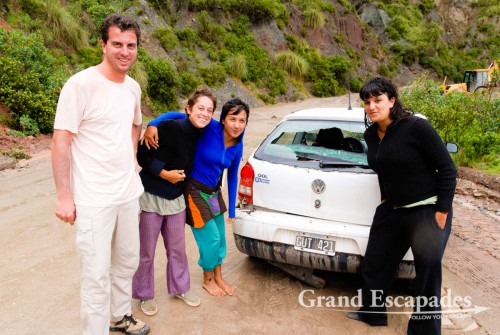 When we raced to our little Gol, the first thing we saw was that the rear window was smashed and the rear bumper hanging down. Only when our three passengers scrambled out of the car did we breathe again. We all hugged each other and could not help laughing being so relieved that we were all unharmed.
