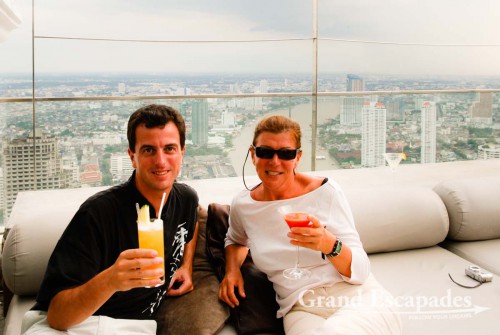 Enjoying a view of Bangkok from high ip, with a cocktail, of course...