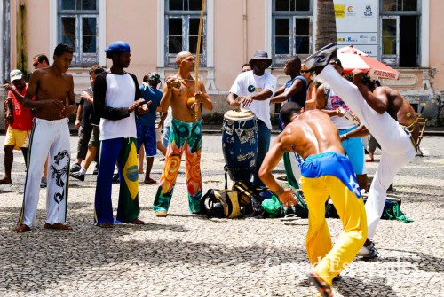 Capoeira dancers performing with their class on the street, Salvador de Bahia, Brazil