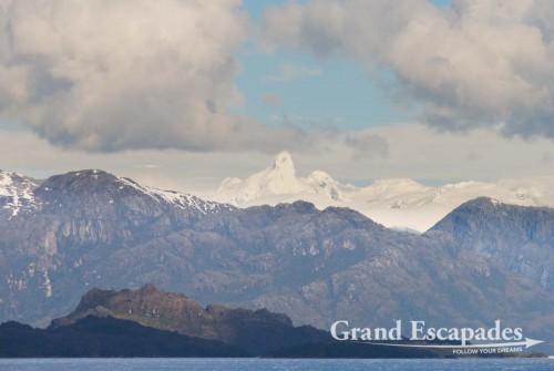 Cruise from Puerto Montt to Puerto Natales, Patagonia, Chile - In the evening we passed another glacier in the distance, as a consequence large junks of ice were drifting along the boat, giving us a really chilly artic feeling