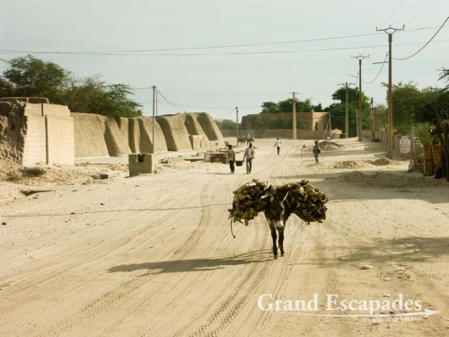 The streets of Timbuktu: tranquil and slow moving. You are always aware that you are at the edge of the Sahara, Timbuktu, Mali