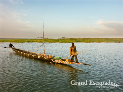 A pirogue starting out for a day of fishing, on the Niger River, near Timbuktu, Mali