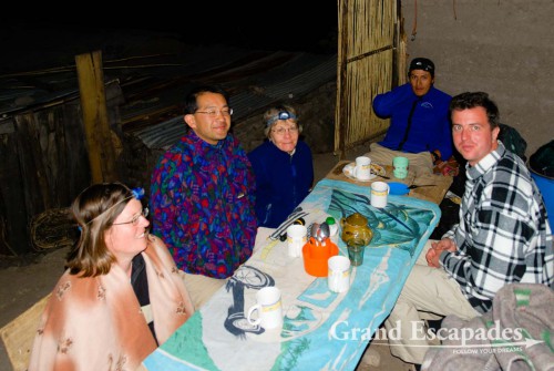 Trekking the Canyon de Colca, the 2nd deepest Canyon on earth, Cabanaconde, Peru - Having dinner outside at 2.950 meters in the small village Fure. Do we look comfortable?