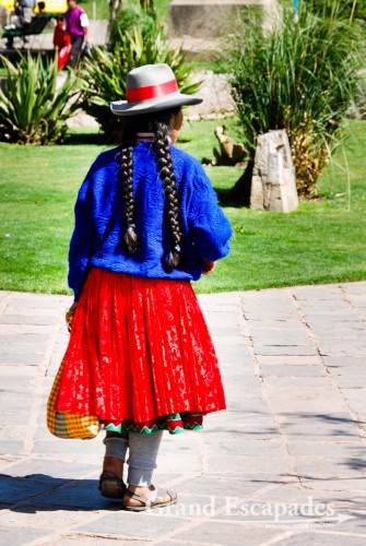 Women in their traditional dresses on the Plaza de Armas, Cuzco, Peru