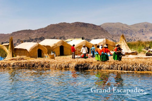 Approaching one of the show-case islands for tourists! - Uros Floating Islands, Lake Titicaca, Peru, South America