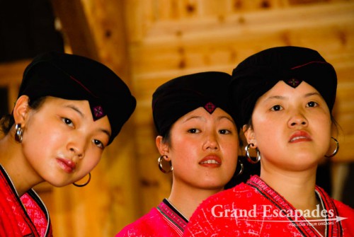 Yan women, famous for their long, pitch-black hair that they whirl around their head like a turban, Ping'An, China
