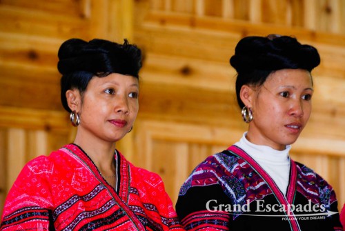 Yan women, famous for their long, pitch-black hair that they whirl around their head like a turban, Ping'An, China