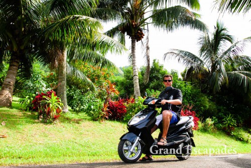 Gilles on a rented scooter in Rarotonga, Cook Islands