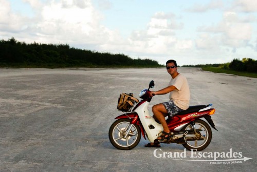 Riding on our scooter ... On the runway! (a short-cut), Atiu Island, Cook Islands