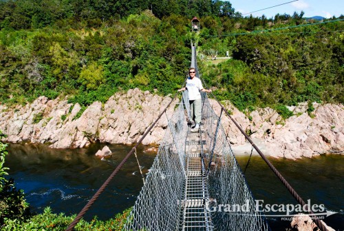 The Buller River can be crossed on foot via New Zealand's longest suspension bridge (110 meters), South Island, New Zealand