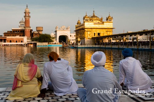 Sikh Pilgrims in front of the Harmandir Sahib (Punjabi: ਹਰਿਮੰਦਰ ਸਾਹਿਬ) or Darbar Sahib, also referred to as the "Golden Temple", a prominent Sikh Gurdwara or Sikh temple, Amritsar, Punjab, India