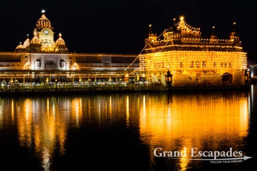 Harmandir Sahib (Punjabi: ਹਰਿਮੰਦਰ ਸਾਹਿਬ) or Darbar Sahib, also referred to as the "Golden Temple", a prominent Sikh Gurdwara or Sikh temple, at night, Amritsar, Punjab, India