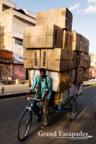 Heavily loaded bike, in the streets of Jaipur, the Pink City, Rajasthan, India