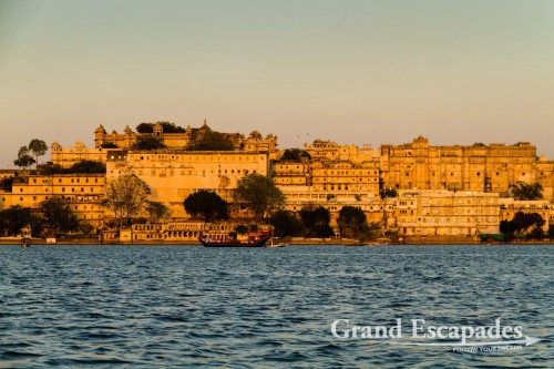 View of the City Palace, during a Boat Ride at Sunset, Lake Pichola, Udaipur, Rajasthan, India