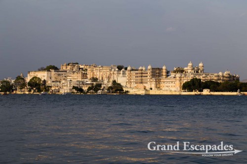 View of the City Palace, during a Boat Ride at Sunset, Lake Pichola, Udaipur, Rajasthan, India