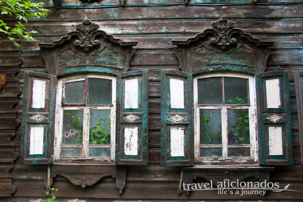 Wooden Houses with painted window panes